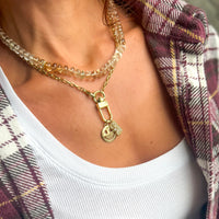 Gold Y2K inspired smiley face charm necklace