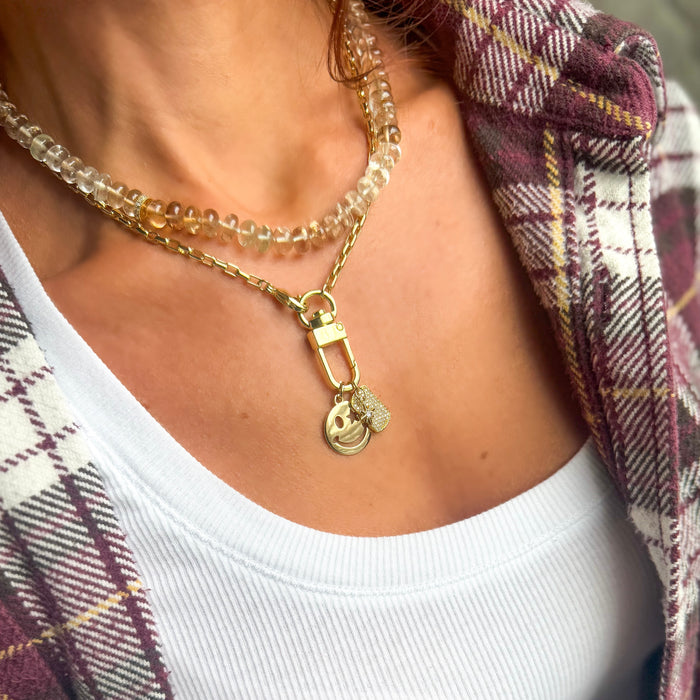 Gold Y2K inspired smiley face charm necklace
