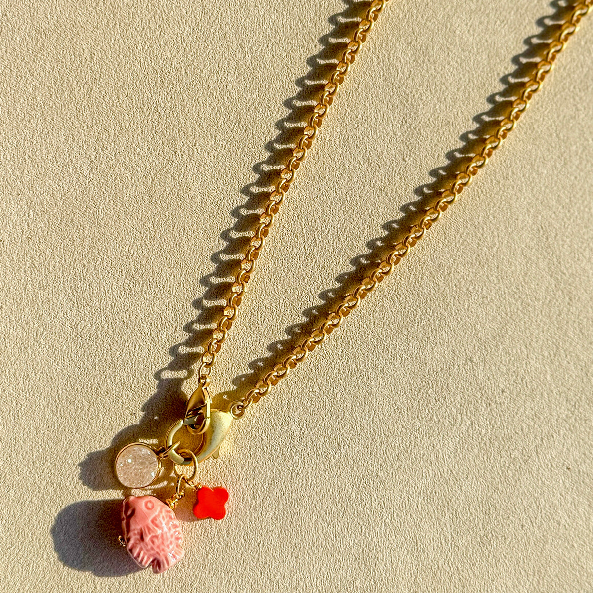 One of a kind fish charm necklace with druzy charm