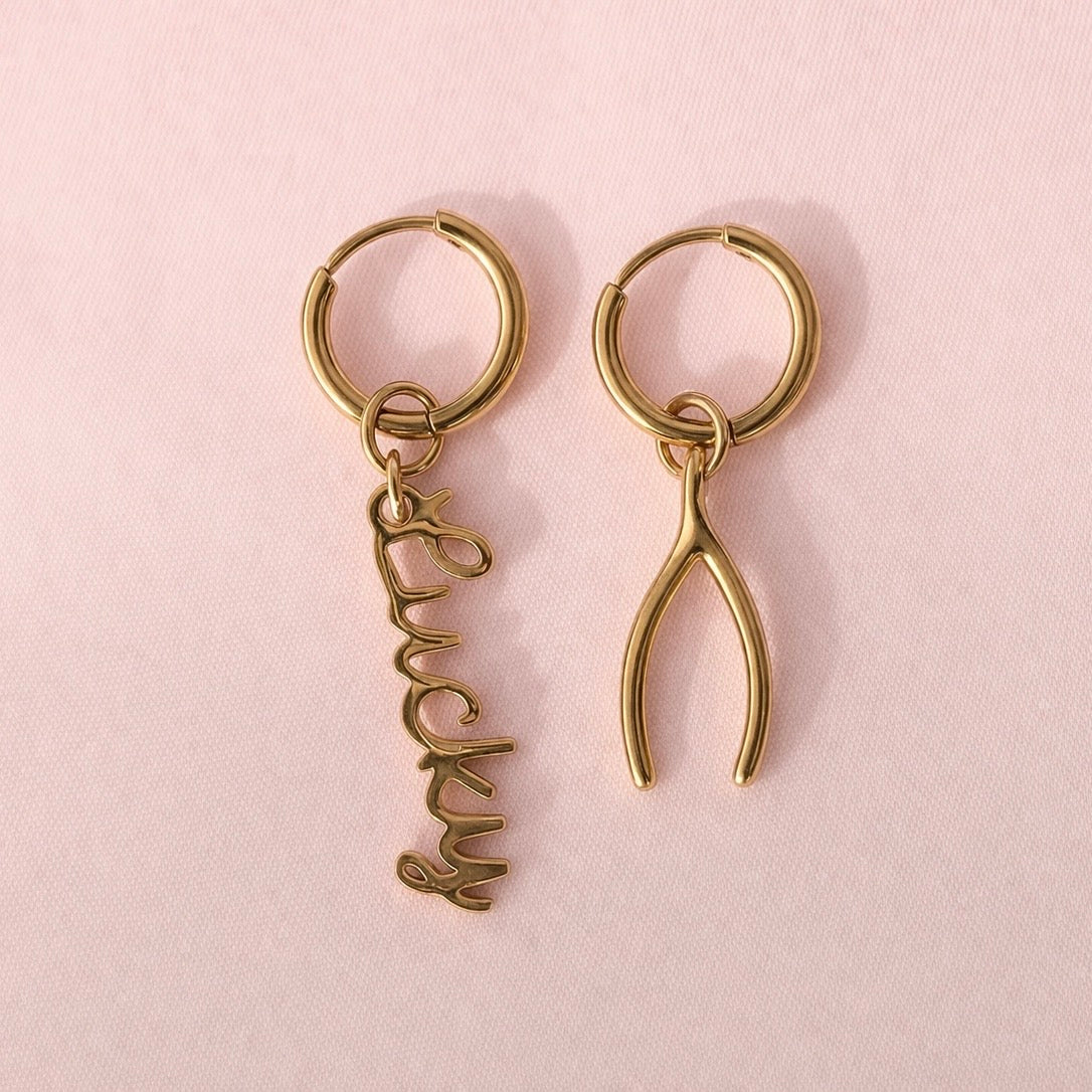 Gold wishbone charm earring — one half of the Lucky mismatched earring set